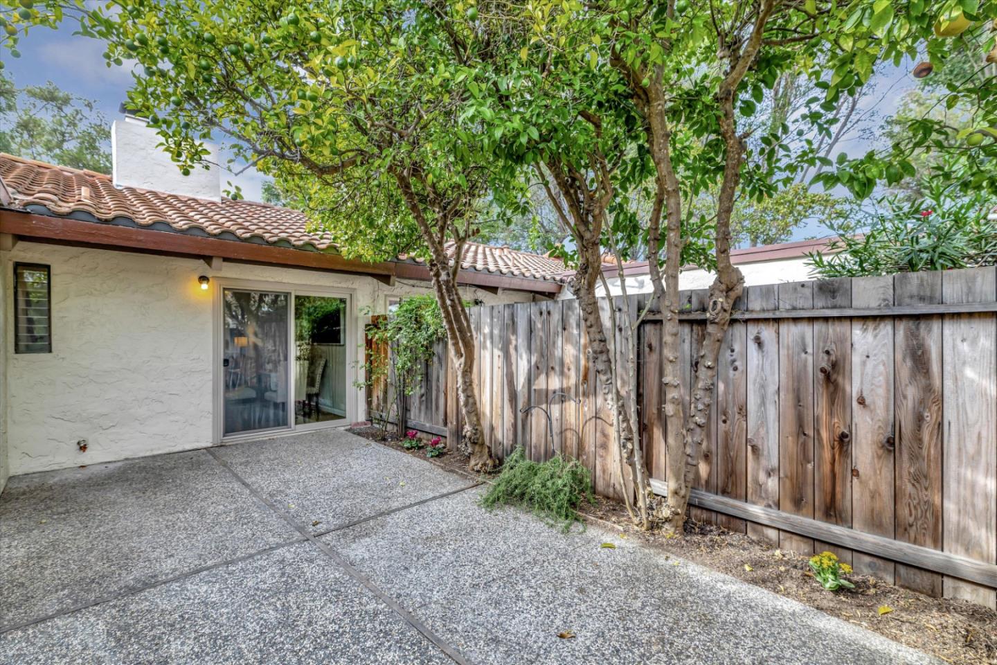 146 Brahms Way Sunnyvale, CA 94087 - Photo 20 of 24 a view of a house with wooden fence