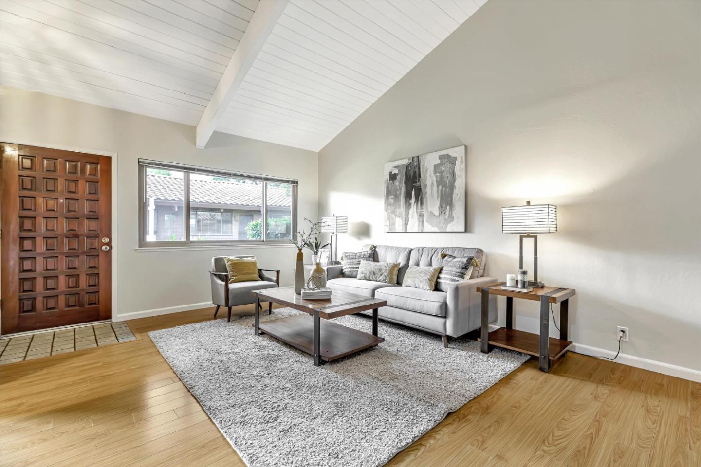 146 Brahms Way Sunnyvale, CA 94087 - Photo 2 of 24 a living room with furniture rug and window