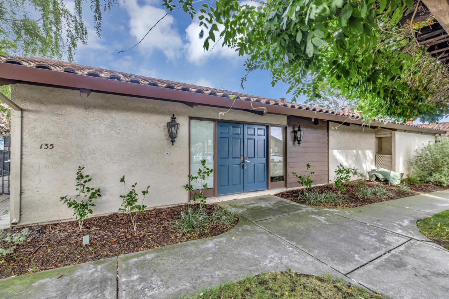 146 Brahms Way Sunnyvale, CA 94087 - Photo 23 of 24 a front view of a house with garden