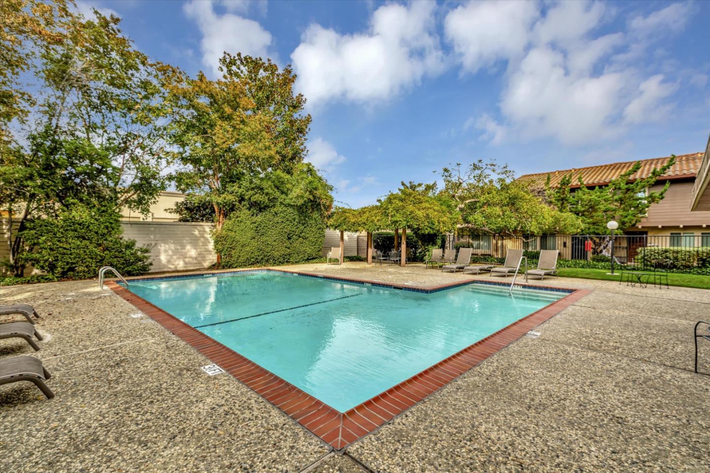 146 Brahms Way Sunnyvale, CA 94087 - Photo 24 of 24 a view of a swimming pool with a yard