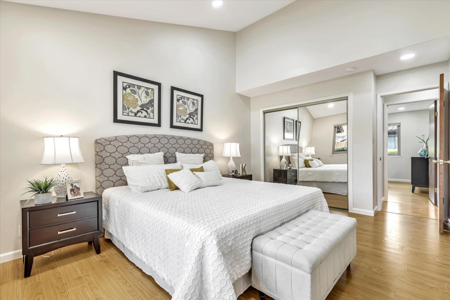 146 Brahms Way Sunnyvale, CA 94087 - Photo 10 of 24 a bedroom with a bed and wooden floor