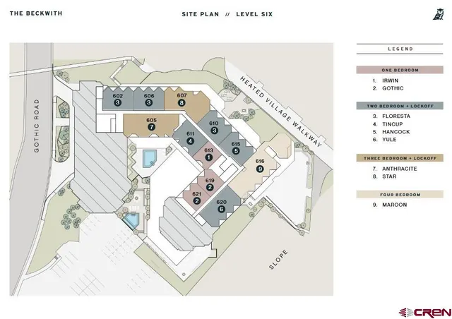 a view of a cafe with a table and chairs under an umbrella