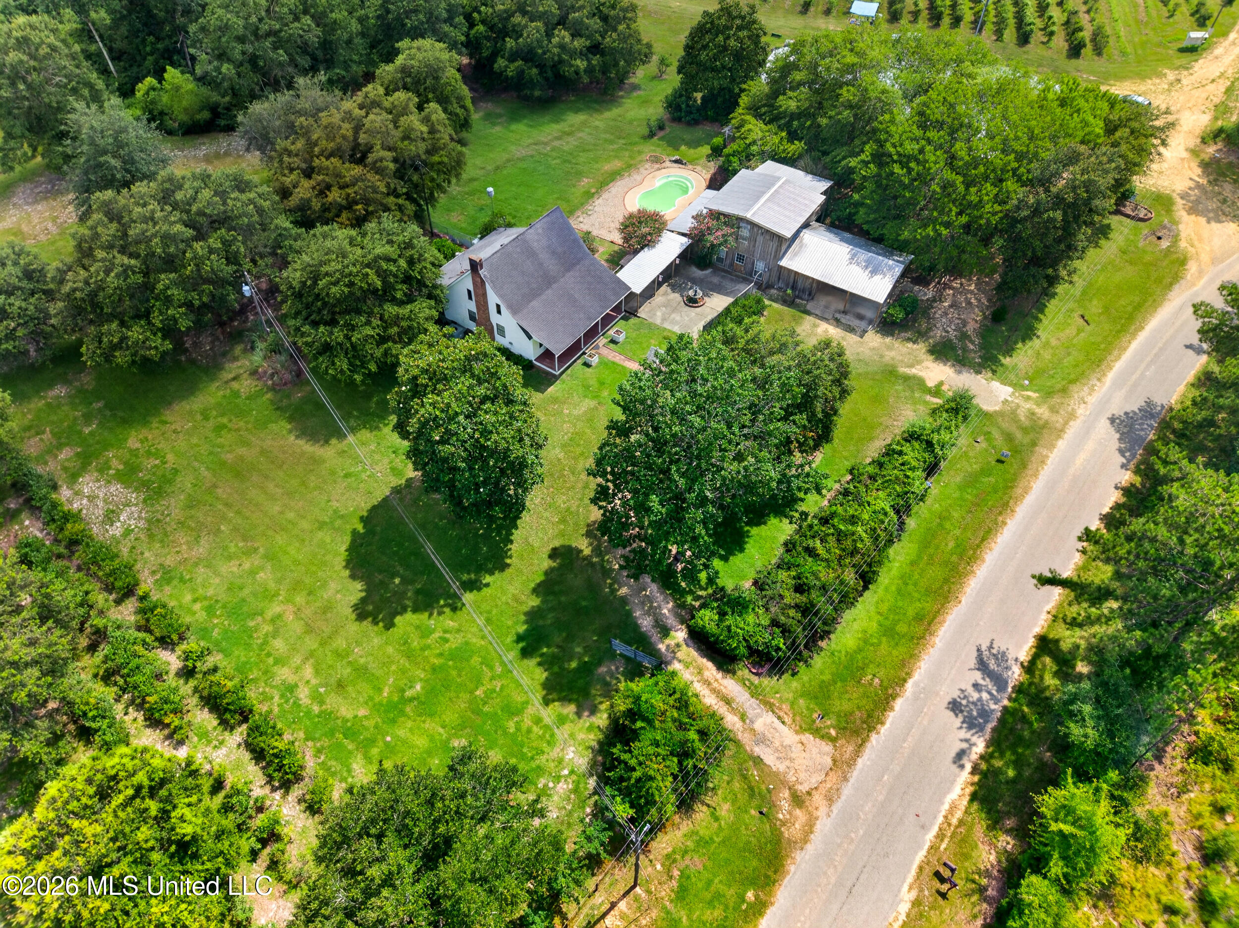 574 Slade Woodward Road Poplarville, MS 39470 - Photo 85 of 106 86_frontyard_perspective