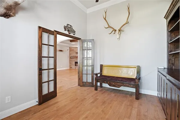 a view of room with furniture and wooden floor