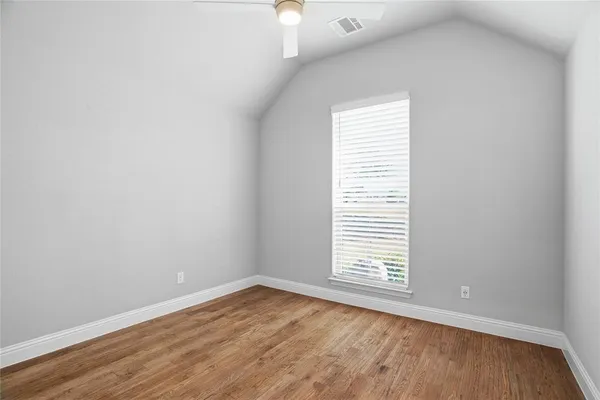 a view of a room that has a window in it