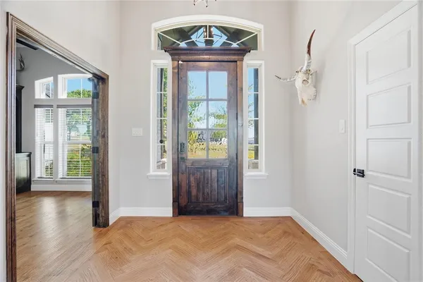 a view of an entryway with a chandelier