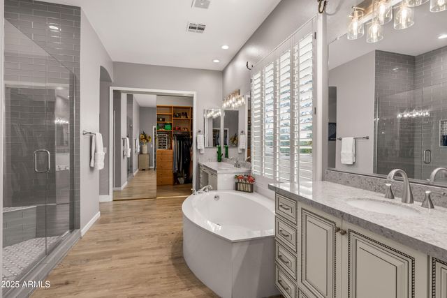 a room with gym equipment and a flat screen tv