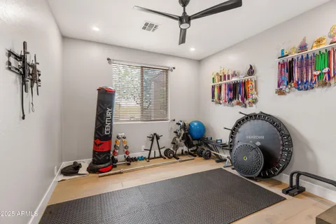 a bathroom with a granite countertop sink mirror and double