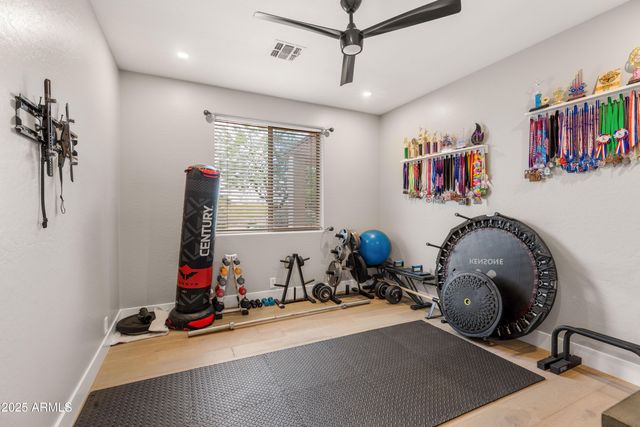 a bathroom with a granite countertop sink mirror and double