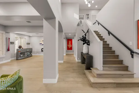 a kitchen with stainless steel appliances granite countertop a sink and cabinets
