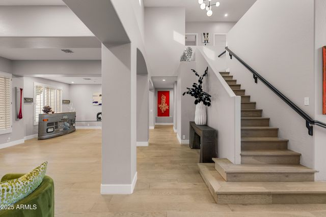 a kitchen with stainless steel appliances granite countertop a sink and cabinets