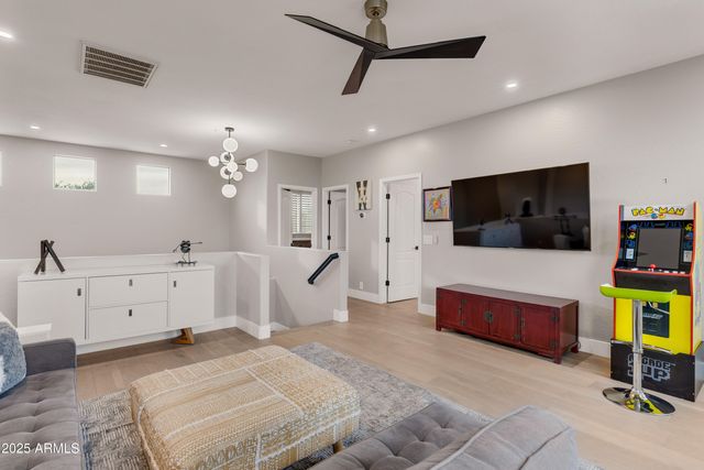 a view of a big yard with a large trees