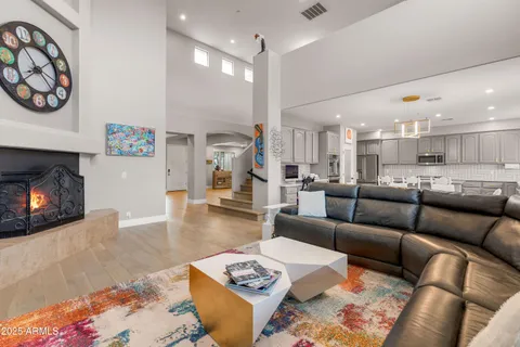 a spacious bedroom with a bed and a window