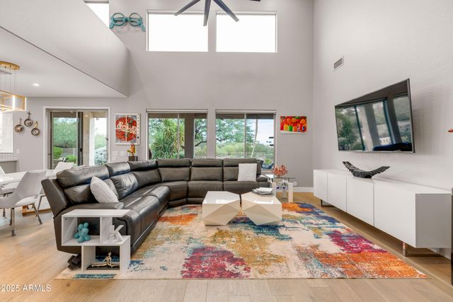 a large spacious bathroom with a large tub shower and sink