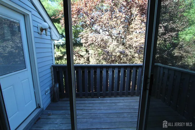 a view of a wooden fence from a balcony