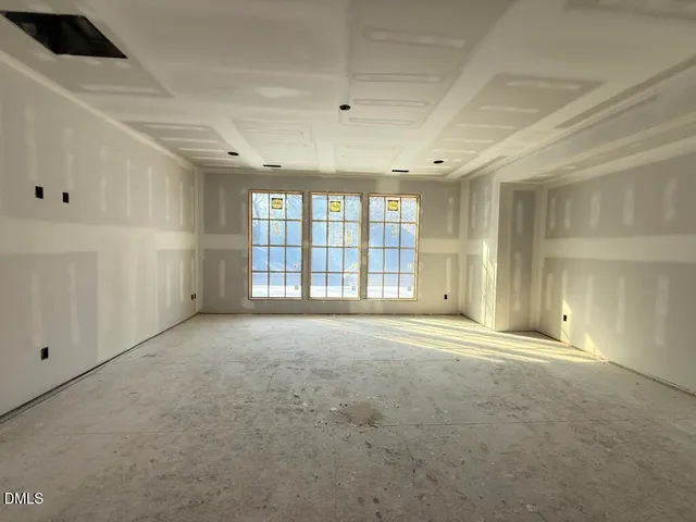 front view of house with deck and outdoor seating