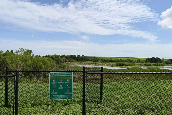 a view of a lake from a balcony