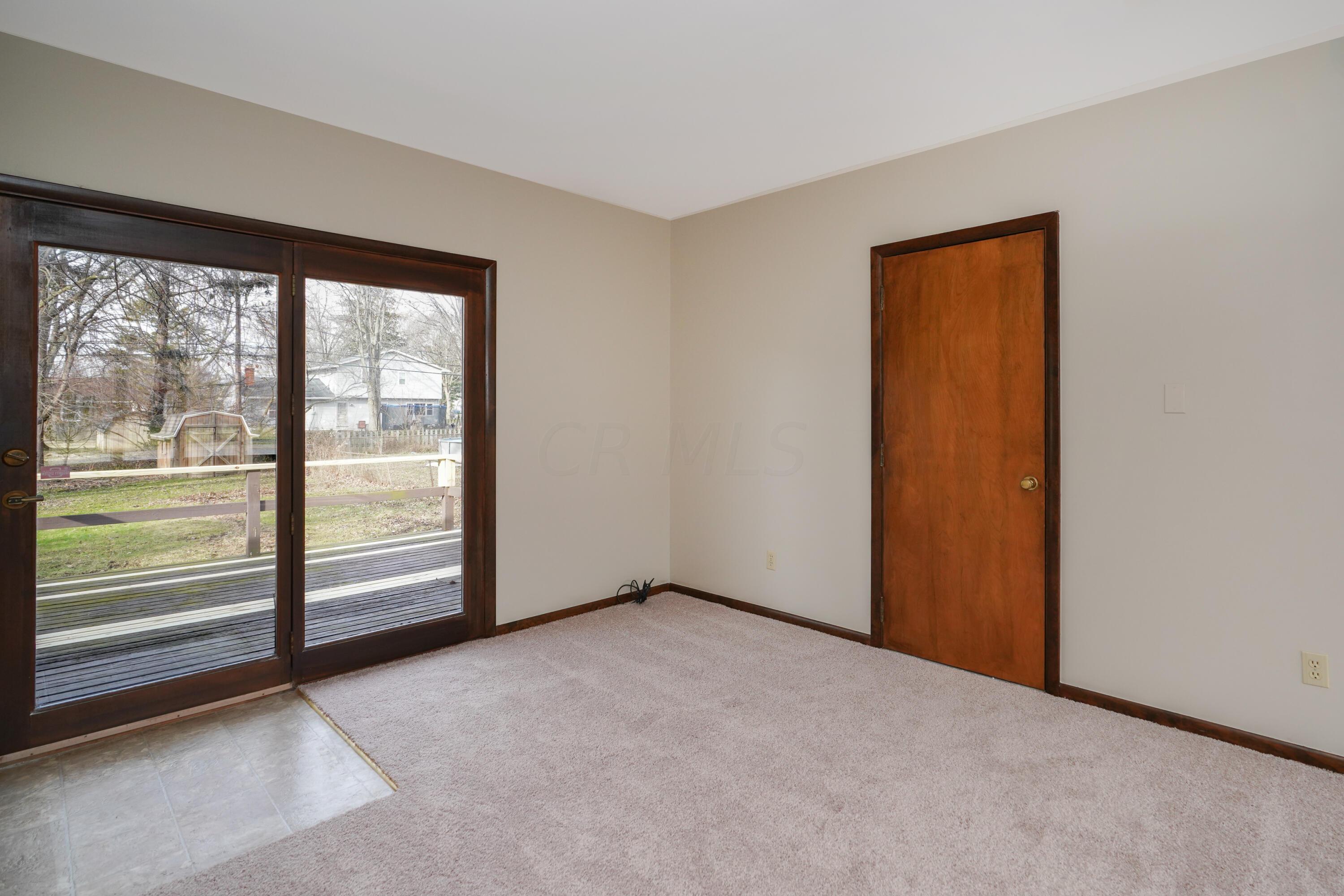 203 Troy Road Delaware, OH 43015 - Photo 12 of 37 Sliding doors to the deck.