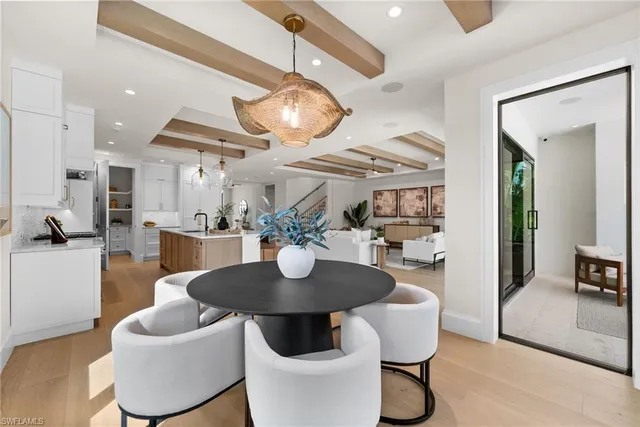 a kitchen with stainless steel appliances granite countertop a stove and a refrigerator