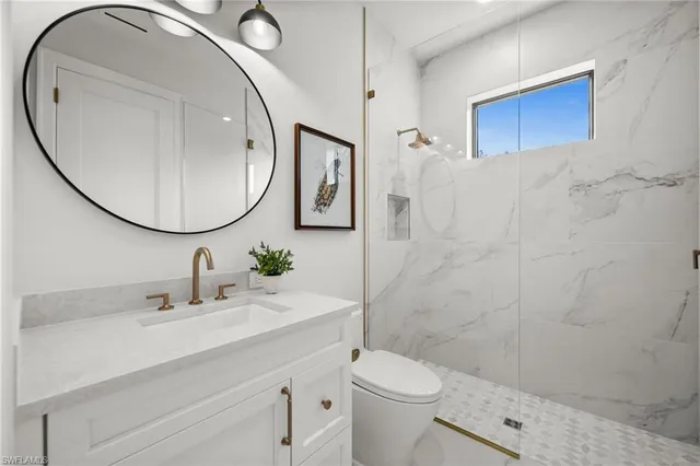 a bedroom with a bed and dresser