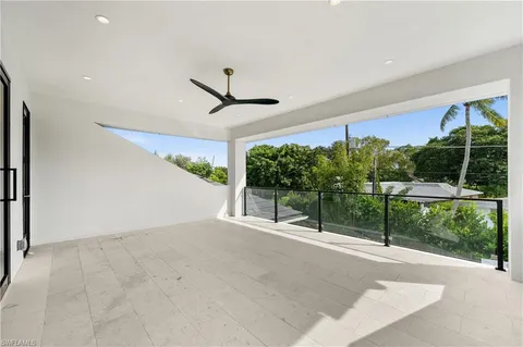 a view of a livingroom with a ceiling fan