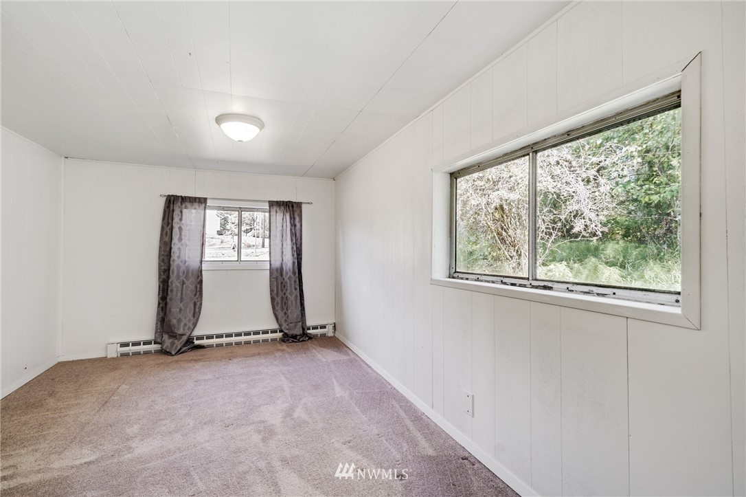 14019 Chain Lake Road Monroe, WA 98272 - Photo 13 of 32 a view of a room with a window