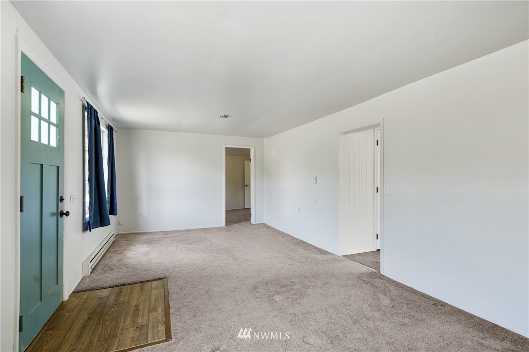 14019 Chain Lake Road Monroe, WA 98272 - Photo 10 of 32 an empty room with windows