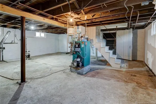 a view of empty room with wooden walls