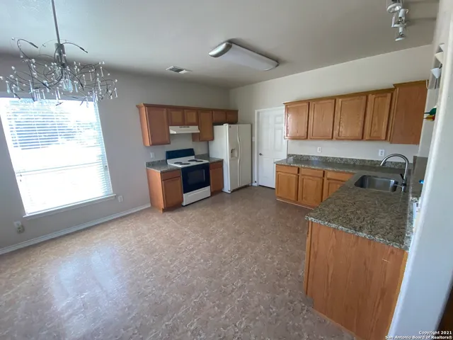 a bathroom with a toilet and sink