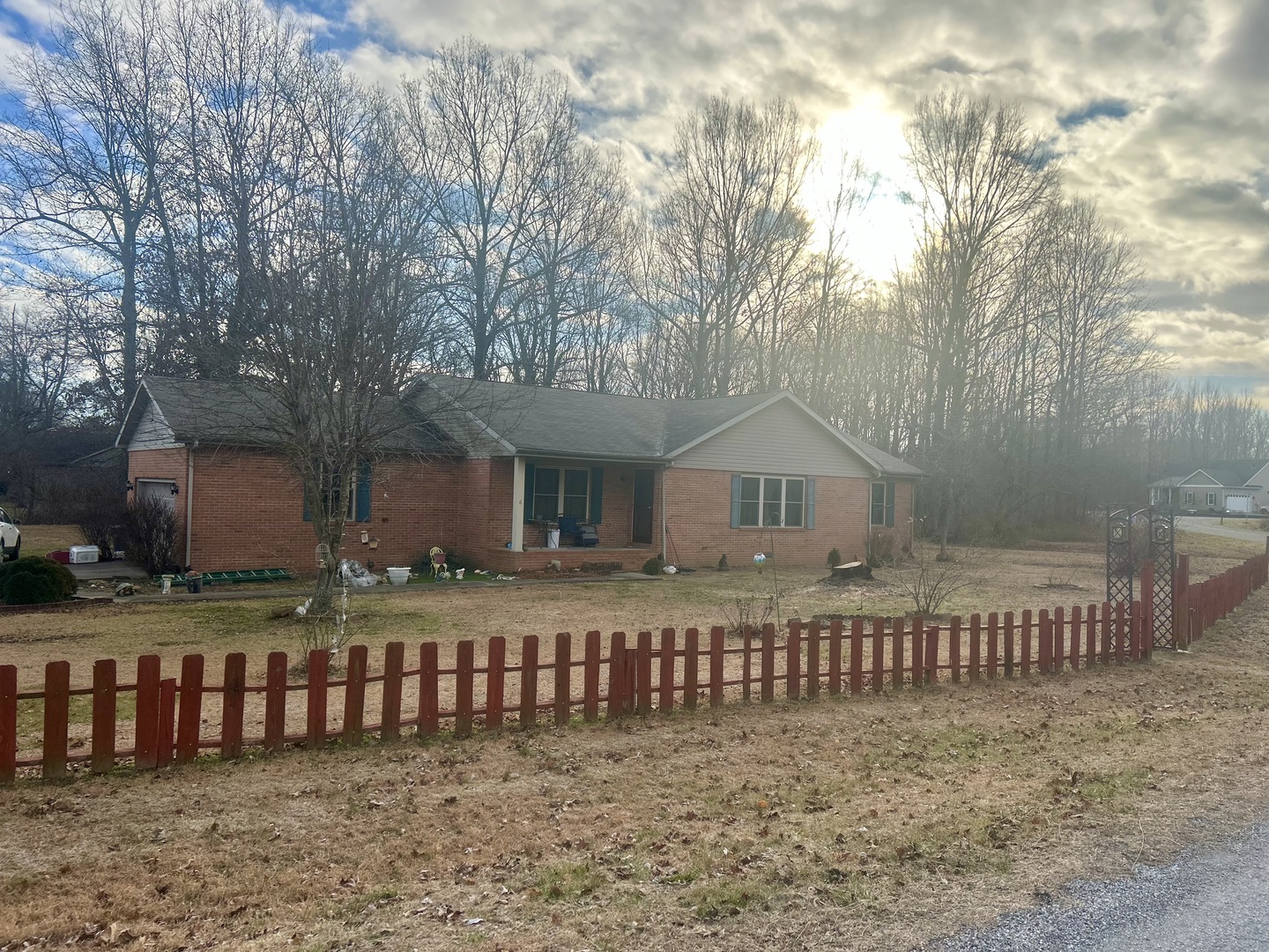 6 Carriage Lane Metropolis, IL 62960 - Photo 2 of 35 a front view of a house with a fence