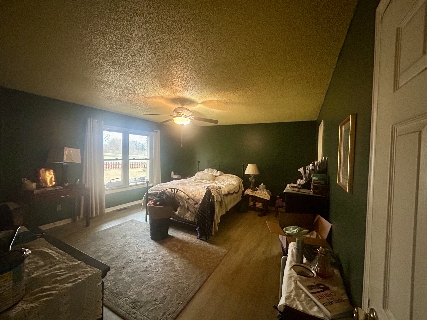 6 Carriage Lane Metropolis, IL 62960 - Photo 26 of 35 a bedroom with a bed and lamp with window