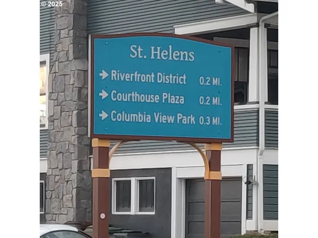 a view of a lake in middle of forest