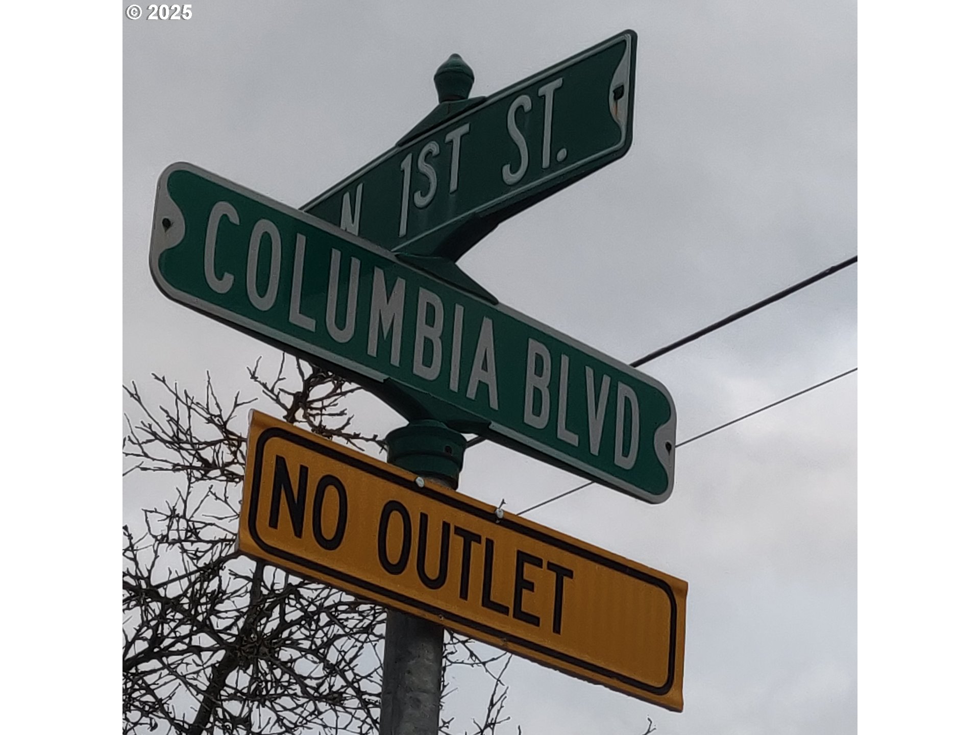 0 North 1st Street St. Helens, OR 97051 - Photo 5 of 7 a street sign that is on top of a pole