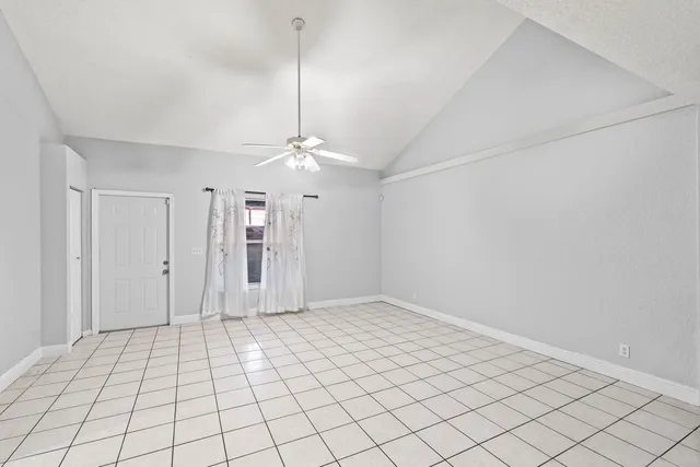 a view of a kitchen with cabinets