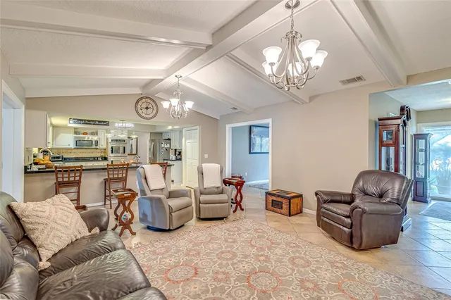 a spacious bathroom with a toilet a sink a mirror a vanity and shower