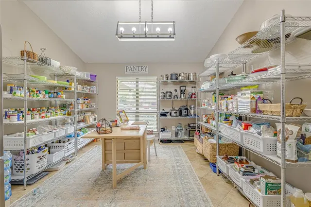 a bed room with furniture and wooden floor