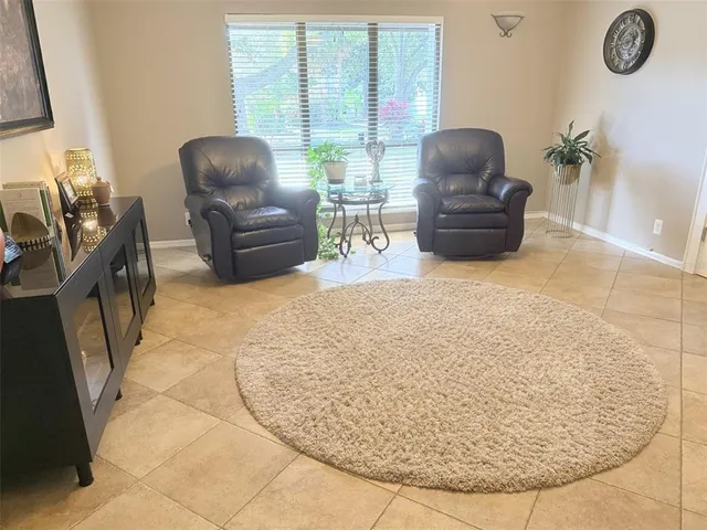 a kitchen with stainless steel appliances granite countertop a stove and cabinets