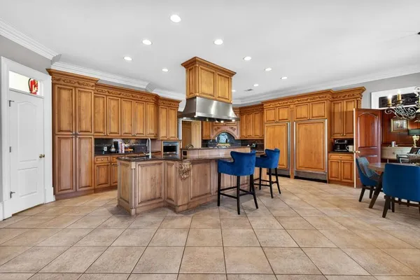 a view of a dining room with furniture large window and wooden floor