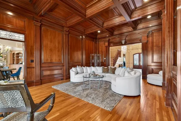 a spacious bathroom with a granite countertop sink a mirror and a shower
