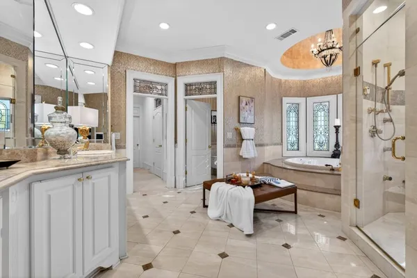 a bathroom with a granite countertop sink a mirror and a