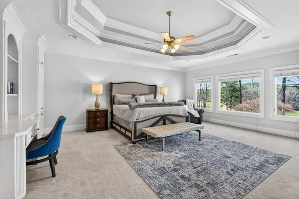 a view of backyard with swimming pool