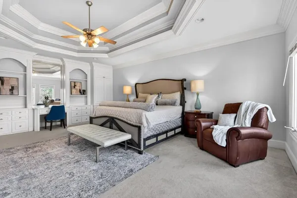 a view of a patio with chairs and tables in the patio