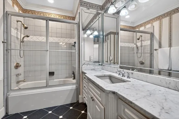 a view of swimming pool with a yard and large trees