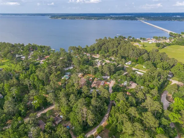 a view of a lake with a building in the background