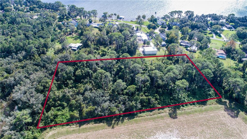 5 Acres nestled in an established waterfront community. All lot lines are approximate. Please refer to Property Appraiser website. A survey is suggested.