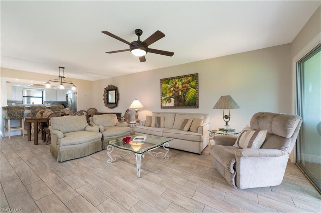 75 St Andrews Boulevard, Unit C301 Naples, FL 34113 - Photo 10 of 41 a living room with furniture