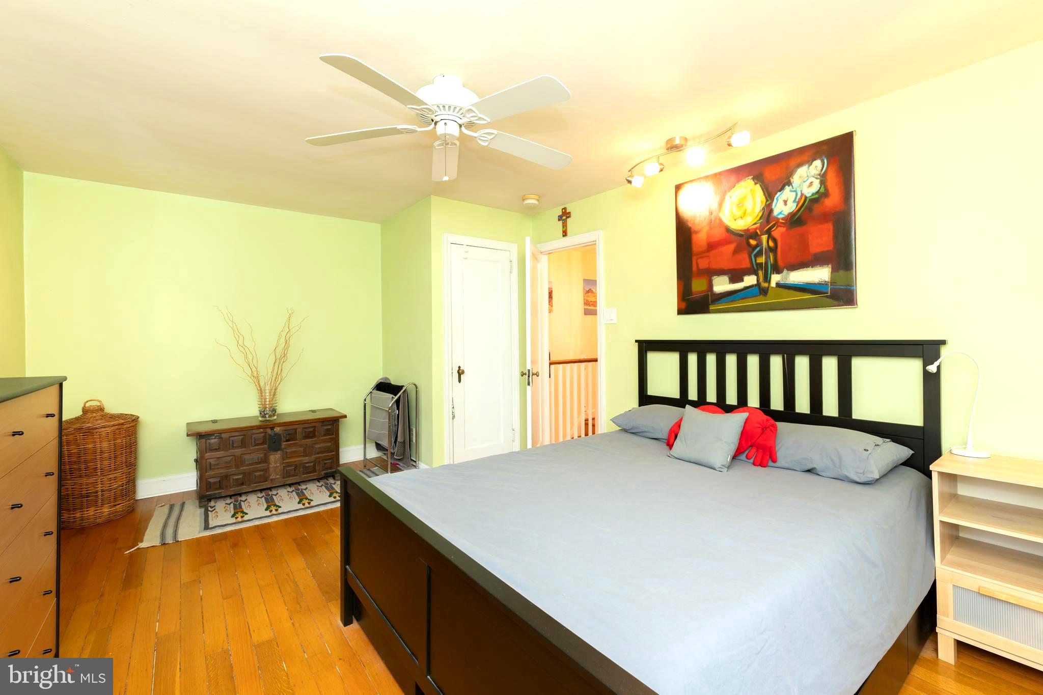 52 Woodbine Road Havertown, PA 19083 - Photo 18 of 38 a bed sitting in a bedroom next to a window