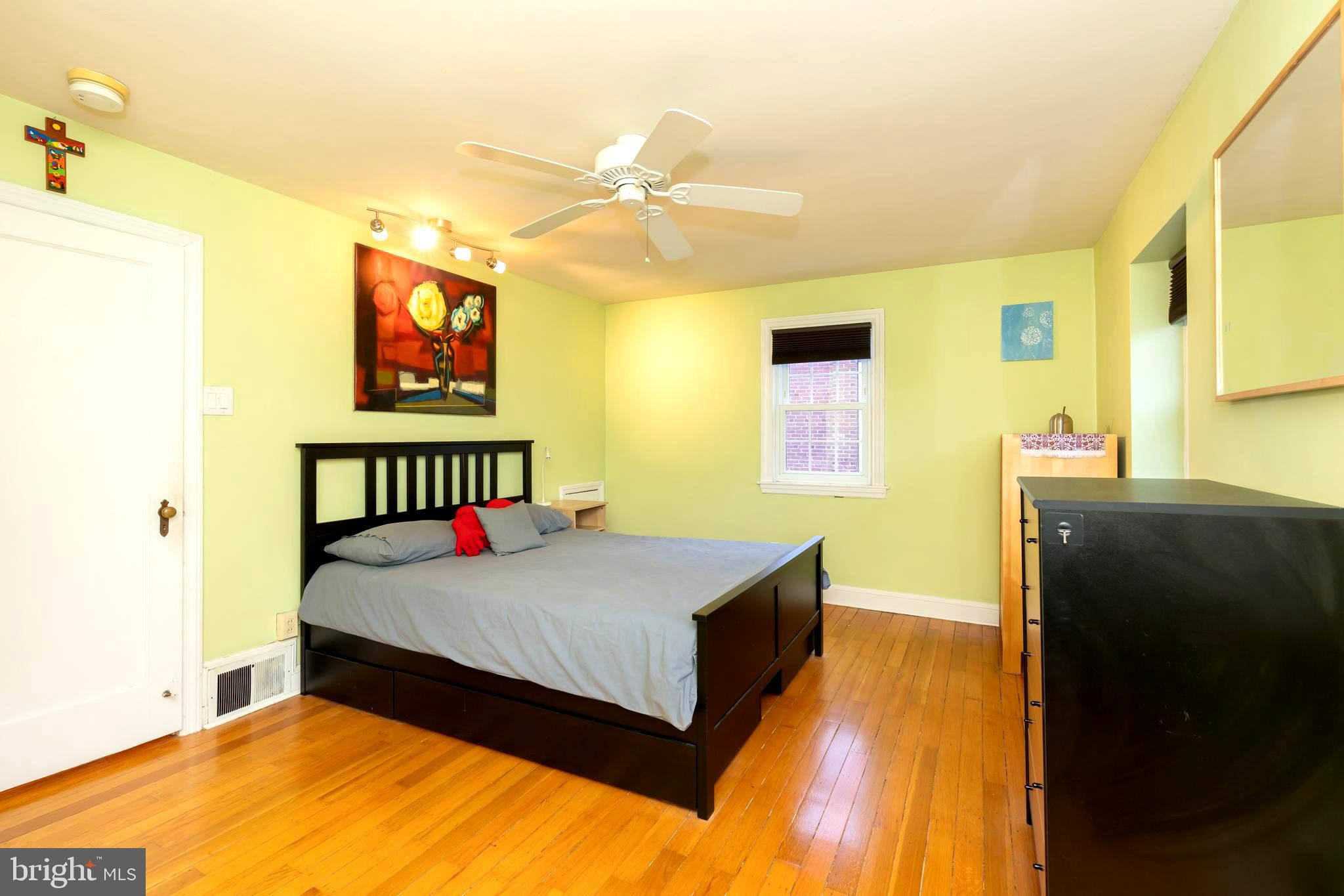 52 Woodbine Road Havertown, PA 19083 - Photo 20 of 38 a bedroom with a bed and a night stand