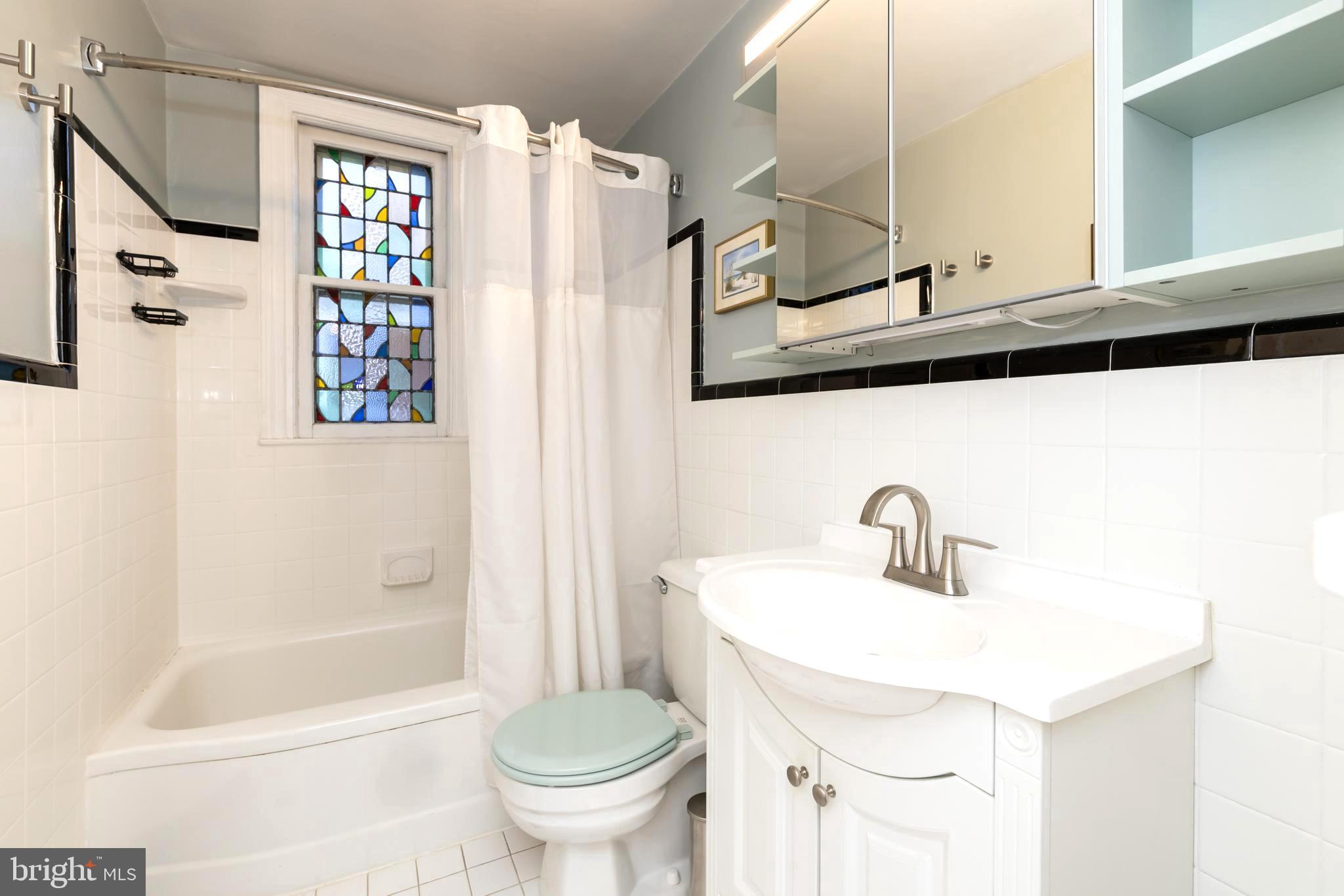 52 Woodbine Road Havertown, PA 19083 - Photo 25 of 38 a bathroom with a sink toilet and shower