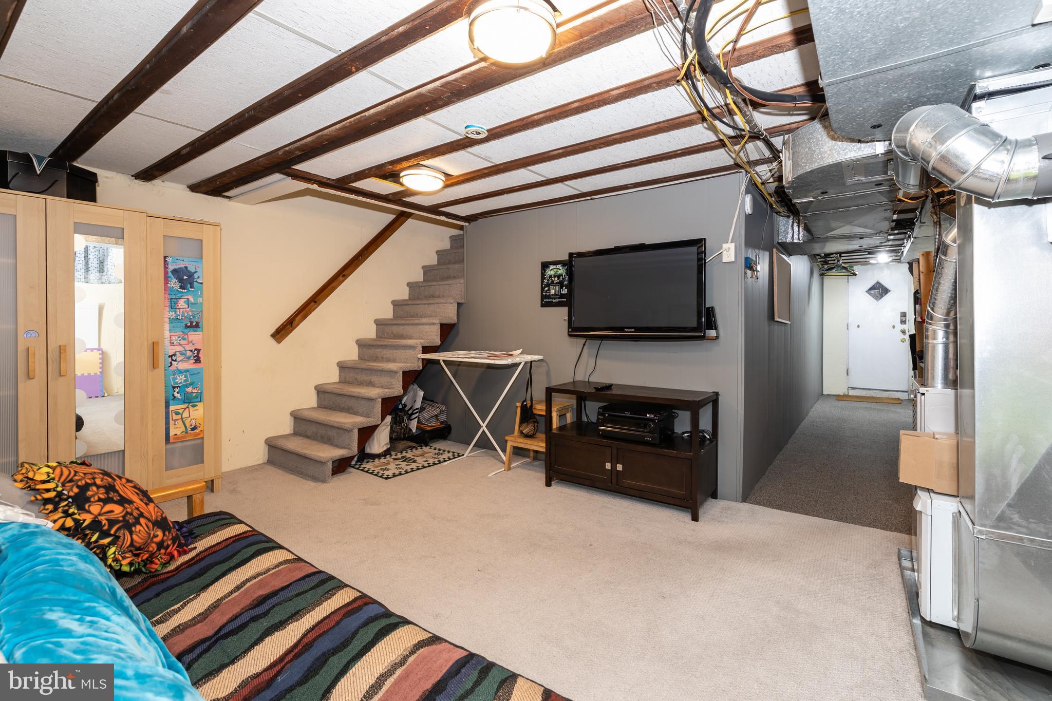 52 Woodbine Road Havertown, PA 19083 - Photo 31 of 38 a bed room with a bed and a television